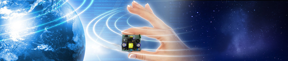 Banner graphic depicting the planet Earth human hand holding electronic circuit against a star-field background